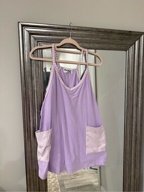 Bucket List Lavender romper with Striped Pocket Details